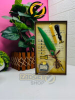 Vintage green feather pen writing set with ink bottle, five nibs, wax seal stamp and sealing wax in a decorative gift box