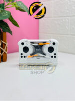 Mini Aerobat D0309 quadcopter secured inside the transparent storage compartment of its white remote