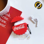 Red cola-style AirPods Pro silicone case with metal carabiner on white background