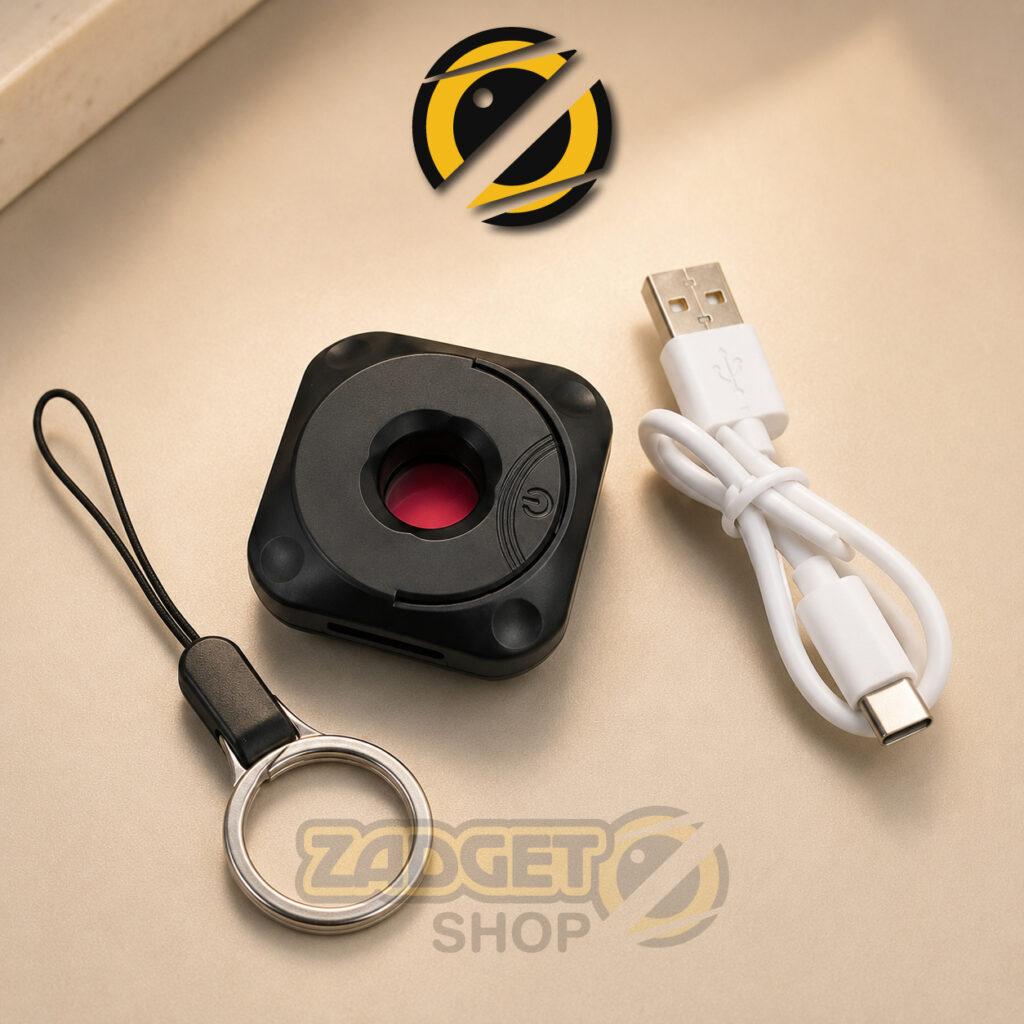 Black Mini Hidden Camera Detector with red LED optical detection lights illuminated