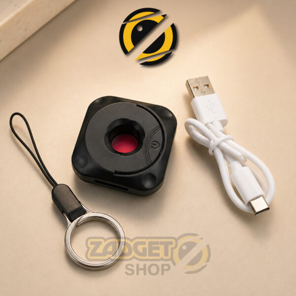 Black Mini Hidden Camera Detector with red LED optical detection lights illuminated