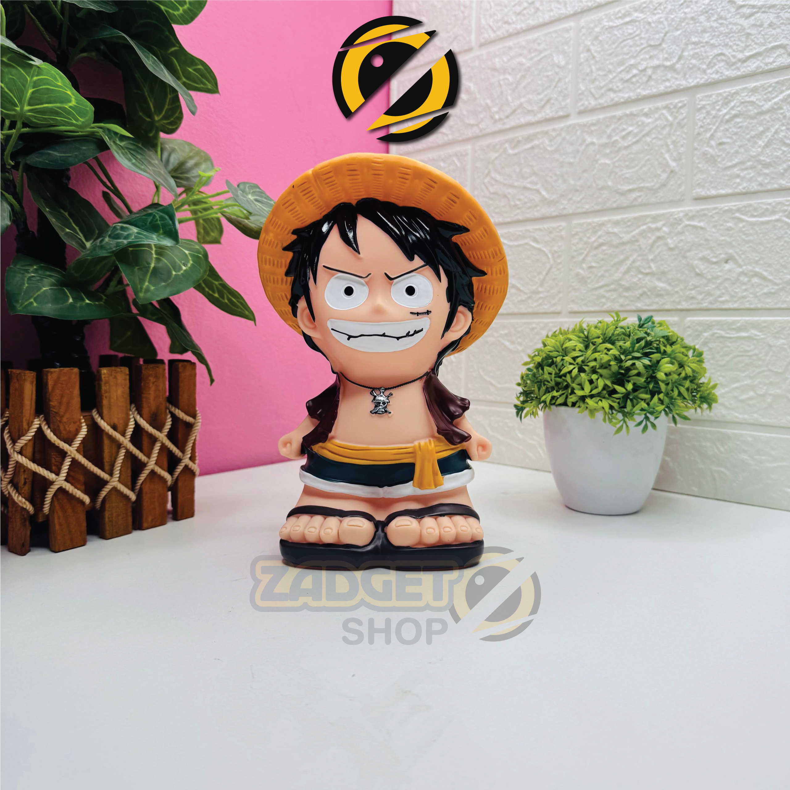 Monkey D. Luffy Coin Bank Front View in Bangladesh Monkey D. Luffy Coin Bank front view with straw hat design at Zadgetshop Bangladesh