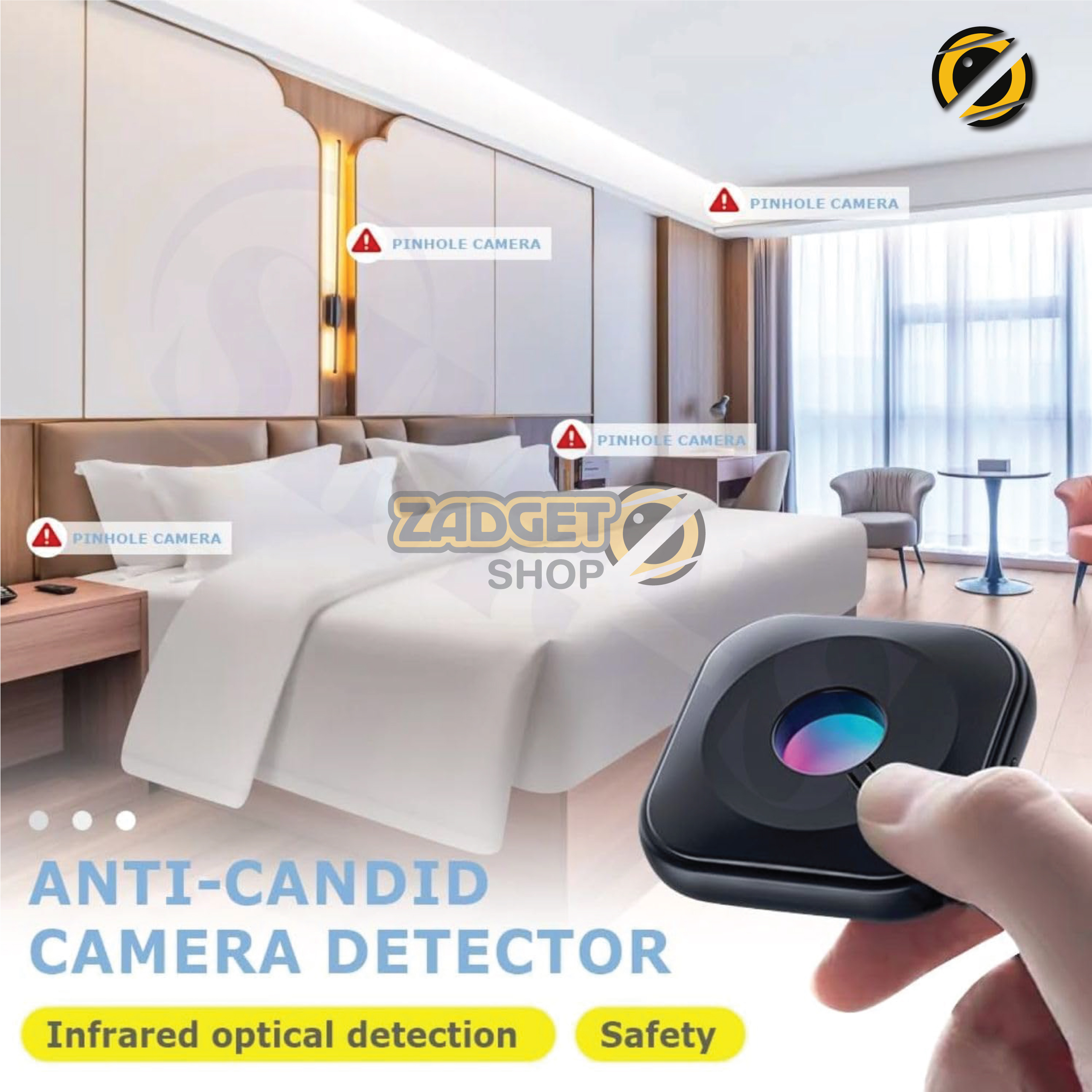 Mini hidden camera detector held to the eye while scanning a darkened hotel room with LED illumination