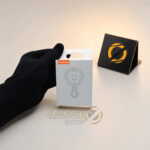 SSOMFEX mini hidden camera detector shown inside its original retail packaging